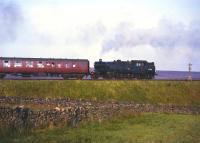 Fairburn 2-6-4T 42210, photographed on Shap in the early 1960s, assisting a heavy passenger train up the bank. <br><br>[Robin Barbour collection (Courtesy Bruce McCartney) //]