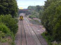View east from the B792 Blackburn Road overbridge as a 158 approaches Bathgate on 28 August. The train is about to pass a set of points installed to provide access to the new STVA car terminal, a project that appears to have been <I>put on hold</I> for the time being.<br><br>[Bill Roberton 28/08/2008]
