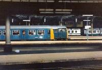 Looking over the east end bays at Newcastle Central on 25 July 1981. Class 101 DMUs in 3 different liveries flank Brush Type 2 31171 at the head of a summer Saturday train for Filey.<br><br>[Colin Alexander 25/07/1981]