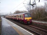 320 310 at Barnhill about to start the final leg of its journey to Springburn on 12 January 2008. <br><br>[David Panton 12/01/2008]