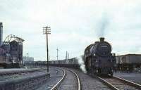 Standard mogul 76096 passing Ayr MPD in 1965 with coal train for Falkland yard.<br><br>[G W Robin 08/08/1965]