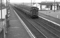 A Glasgow - Ayr DMU arrives at Barassie in August 1963. [See image 30000]<br><br>[Colin Miller 23/08/1963]