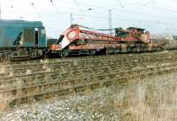 A redundant Cravens breakdown crane stands in the sidings opposite Kingmoor depot on 20 February 1982.<br><br>[Colin Alexander 20/02/1982]