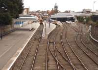 View from Belgrave Terrace road bridge into Scarborough station early on Sunday 28 September 2008. On the left is the northern end of the lengthy former excursion platform 1 with its own passenger buildings, central canopy, station exit and record-breaking 456 feet long public bench. Platforms 1 and 2 are being used on this occasion for the overnight stabling of Northern and First TransPennine stock, while the main operational platforms 3-5, located within the station's remaining train shed, below the clock tower on Westborough Road, are unoccupied. Former railway buildings can also be seen on the right.<br><br>[John Furnevel 28/09/2008]