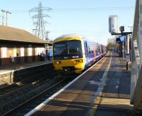 DMU 165129 calls at Thatcham station on 6 Dec 2008 with a Reading - Newbury service.<br>
<br><br>[John McIntyre 06/12/2008]