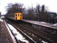 A <I>Thumper</I> DEMU arriving at a snowy Uckfield in 1974. [The original Lewes & Uckfield station was replaced by new station in 1991.]<br><br>[Ian Dinmore //1974]