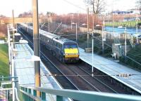 An ECML Kings Cross - Edinburgh Waverley - Glasgow Central GNER service speeds north through Wallyford station on a bright and chilly 12 January 2003.<br><br>[John Furnevel 12/01/2003]