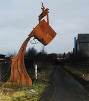 Pouring metal sculpture just to the west of the former triangular junction at Bathgate on the Airdrie and Morningside (Lanarks) routes. View looks to Bathgate.<br><br>[Ewan Crawford 26/12/2008]