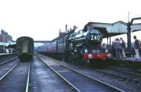 An Ian Allan Railtour stands at platform 2 at Worcester Shrub Hill on 8 August 1965. The special had arrived from Paddington via Oxford and returned via Swindon and the GWR main line, hauled by preserved 4079 <I>Pendennis Castle</I> throughout. <br><br>[Robin Barbour Collection (Courtesy Bruce McCartney) 08/08/1965]
