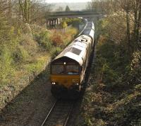 EWS 66201 passing the disused Ashton Gate station, Bristol, on the Portbury Line with a train of coal empties on 24 November 2008<br><br>[Peter Todd 24/11/2008]