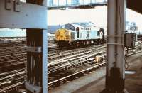 A class 37 takes empty stock through Newcastle Central in 1984.<br><br>[Colin Alexander //1984]