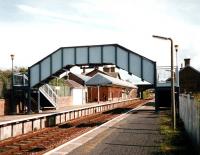 View towards Carlisle from Annan station in October 1997, before demolition of the platform buildings on the right.<br><br>[David Panton /10/1997]