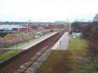 Roose, on the outskirts of Barrow in Furness, has been reduced to basic facilities but still enjoys a reasonable service of trains between Barrow and Lancaster. The housing development that can be seen in this picture should assist patronage. View towards Furness Abbey and Dalton. <br><br>[Mark Bartlett 17/01/2009]