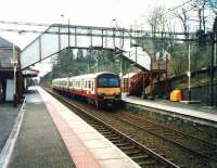 320 316 on a Milngavie service calls at Bearsden in March 1999.<br><br>[David Panton 01/03/1999]
