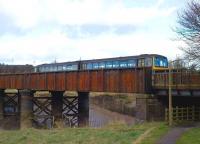 143619 crossing the bridge over the River Trym shortly after leaving Sea Mills station on 23 January with the 1234 Bristol Temple Meads - Avonmouth service. <br>
<br><br>[Peter Todd 23/01/2009]