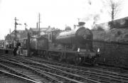 D34 4-4-0 no 256 <I>Glen Douglas</I> taking water at the west end of Alloa on 30 March 1964 with <i>Scottish Rambler No 3</i>. The train will leave shortly for the next leg of the railtour, heading for Larbert via Alloa Swing Bridge.<br><br>[K A Gray 30/03/1964]