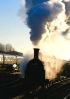 Sun, smoke and steam. 55189 at Boness with a photo-charter on 24 February 2009.<br><br>[John Robin 24/02/2009]