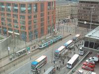 A Metrolink tram rolls into Piccadilly Gardens, in Manchester City Centre, from Piccadilly Station. From here it will either turn right for Bury or left for Altrincham or Eccles. View from nearby City Tower. [see image 29737] for an update.<br><br>[Mark Bartlett 25/02/2009]