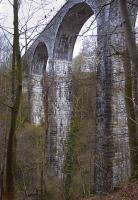 Fine looking viaduct over the Pow Burn a mile or so west of Rumbling Bridge in March 2009.<br><br>[Bill Roberton 02/03/2009]