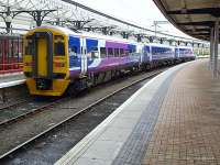 3 car class 158 of Northern Rail leaves York to travel across the Pennines to Blackpool on 16th February<br><br>[Brian Forbes 16/02/2009]