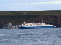 The morning ferry backs off from the floating gangway at Scrabster before heading north to Stromness. The ferry terminal is approximately 2 miles from Thurso station.<br><br>[Brian Forbes 27/03/2009]