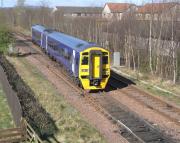 The bald-looking 159 782, long painted out of SWT livery but still unbranded, passes Thornton West Junction approaching Glenrothes with Thornton station with an outer circle service.<br><br>[David Panton 14/04/2009]