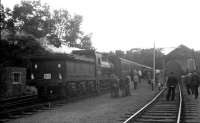 65234 on a railtour at Penicuik in August 1964. [See image 23124]. District Operating Inspector Kerr stands in the 4 foot on the right, hands behind his back, keeping an eye on the proceedings.<br><br>[K A Gray 29/08/1964]