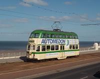 Most of Blackpool's trams seem to be in garish advertising liveries these days so it was nice to see <I>Balloon</I> double deck car 723 in Corporation Green and Cream, albeit this is one of the modified trams with modern bus windows installed to replace the originals. It is seen here on driver training duty, complete with L plates, heading north from Blackpool passing the Imperial Hotel on the elevated stretch of promenade south of Gynn Square. A new tram stop was later constructed at this point as part of the refurbishment of the tramway. [See image 37614]<br><br>[Mark Bartlett 12/05/2009]