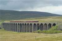 5690 'Leander' crosses Ribblehead viaduct with the southbound <I>Settle - Carlisle Express</I> railtour on 17 May 2009. The tour was running over 20 minutes ahead of schedule as it coasted over the viaduct.<br><br>[John McIntyre 17/05/2009]