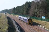 With redoubling and bridge alterations complete, a Bathgate - Waverley service approaches the site of Bangour Jct on 18 March 2009. Electrification is due to arrive soon, marking an end to regular diesel traffic on the line.<br><br>[James Young 18/03/2009]