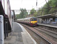 320 311 arrives at High Street on 20 June 2009 with a Springburn to Dalmuir Service.<br><br>[David Panton 20/06/2009]