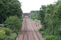 View East from the B792 overbridge as electrification masts and Stop boards for shunting moves appear. The overbridge in the distance will shortly be rebuilt for electrification. To the right is the headshunt for the now mothballed <i>STVA yard</i>. <br><br>[James Young 08/07/2009]
