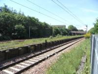 The remains of the former main line platforms at Rutherglen in June 2009 looking west towards Glasgow Central. The platforms were abandoned when the Argyle line opened in 1979. <br><br>[David Panton 01/06/2009]