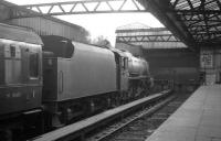 Black 5 no 45084 of Stirling South shed stands at the buffer stops at Glasgow Buchanan Street on 23 August 1965.<br><br>[K A Gray 23/08/1965]