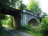 At Dalveich, about two miles out of Lochearnhead, is this combined bridge that carried the railway over a burn and a farm road.<br><br>[John Gray 30/07/2009]