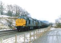 A pair of class 37s with an eastbound coal train at Beith North in 1986.<br>
<br>
<br><br>[Colin Miller //1986]