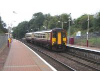 Calling at Ashfield station on 8 August 2009 is unit 156 445 with a service on the short Glasgow Queen Street to Anniesland route, with an end to end journey time of just 14 minutes.<br><br>[David Panton 08/08/2009]