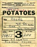 This is a freight wagon label found in the debris of then (August 1980) disused and vandalized Rayne station in Essex. It refers to a consignment of seed potatoes transported from Leysmill (for Friockheim) on the former Arbroath to Forfar line to a farmer in Rayne. Despatched on 22 November 1961, the sacks of potatoes travelled via Berwick and Whitemoor before arriving at Rayne at 10 a.m. a mere 3 days later. Rayne was closed to goods on December 7th 1964 (regular passenger traffic had ceased in 1952).<br><br>[Mark Dufton 03/08/1980]