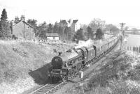 Jubilee 4-6-0 no 45588 <I>Kashmir</I> westbound on the former Dumfries, Lochmaben and Lockerbie Junction route on 15 April 1963 with the 4-day SLS/BLS Easter Special Rail Tour <I>'Scottish Rambler no 2'</I>. The special is seen here approaching Dumfries. <br>
<br><br>[K A Gray 15/04/1963]