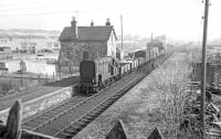 The returning branch pick-up goods rumbles through Earlston at Easter 1965 on its way back from Greenlaw to St Boswells.<br><br>[Bruce McCartney //1965]