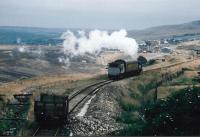 The Blaenavon Express: the P&B used to have only one operating steam engine, with BROOKFIELD emblazoned on its tanks IIRC. It is pushing its single coach up to the later location of Whistle Inn halt in September 1991. The 'landscaped' background looks distinctly bleak; as viewers of the TV programme 'Time Team' will know, it contains a buried viaduct.<br><br>[Ken Strachan /09/1991]