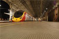A northbound Pendolino pauses on a deserted Platform 3 at Preston on the evening of 10 October 2009. All the activity was over on Platform 6 (to the right) where A1 Pacific 'Tornado' had arrived with a railtour from Carlisle.<br><br>[John McIntyre 10/10/2009]