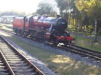 Newly restored Ashford Works built LMS 8F 48624 stands opposite Rowsley Station during mixed traffic day. <br><br>[David Pesterfield 11/10/2009]