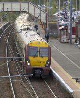 334040 at the head of a service to Glasgow Central drawing away from Johnstone on 7th October 2009<br><br>[Graham Morgan 07/10/2009]