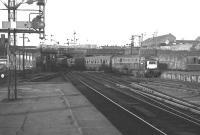 The 17.15 Aberdeen - Glasgow train arrives at Buchanan Street station in August 1966 behind NBL Type 2 locomotive no D6106.<br><br>[Colin Miller /08/1966]
