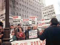 Scene of a demonstration in Whitehall, SW1, on 18 December 1968, with the Waverley petition party on the march. A young looking David Steel is standing alongside Madge Elliot, with an even younger looking Bruce McCartney holding the placard demanding <I>STOP THE GREAT TRAIN ROBBERY</I>. <br>
<br><br>[Bruce McCartney Collection 18/12/1968]