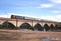 A train from the north slows across the old Ness Bridge in Inverness in 1977.<br><br>[Frank Spaven Collection (Courtesy David Spaven) //1977]