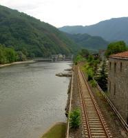 View south from the Ponte della Maddalena at Borgo a Mozzano, Tuscany, showing the Lucca - Aulla line running along the west bank of the River Serchio.<br><br>[Iain Steel 07/08/2007]