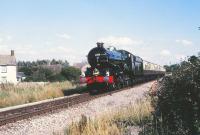 6000 <I>King George V</I>, northbound at Purton station on the Swindon - Gloucester line on 21 August 1985. Star of the GWR 150 celebrations. (The 175 'do' is now rapidly approaching.)<br>
<br><br>[Peter Todd 21/08/1985]