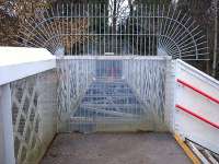 The blocked off redundant section of the station footbridge that once spanned the goods lines behind platform 2 on the west side of Ruabon Station, photographed in December 2009.<br><br>[David Pesterfield 15/12/2009]